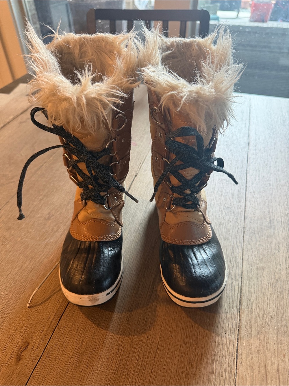 Sorel Women’s Black and Tan Faux Fur Winter Lace-Up Boots